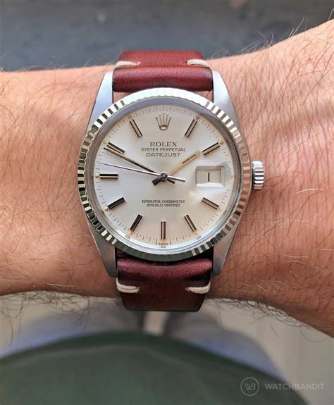 rolex datejust on leather strap.